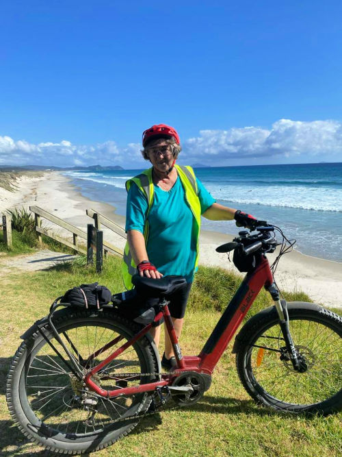 Rain with bike and ocean in the background