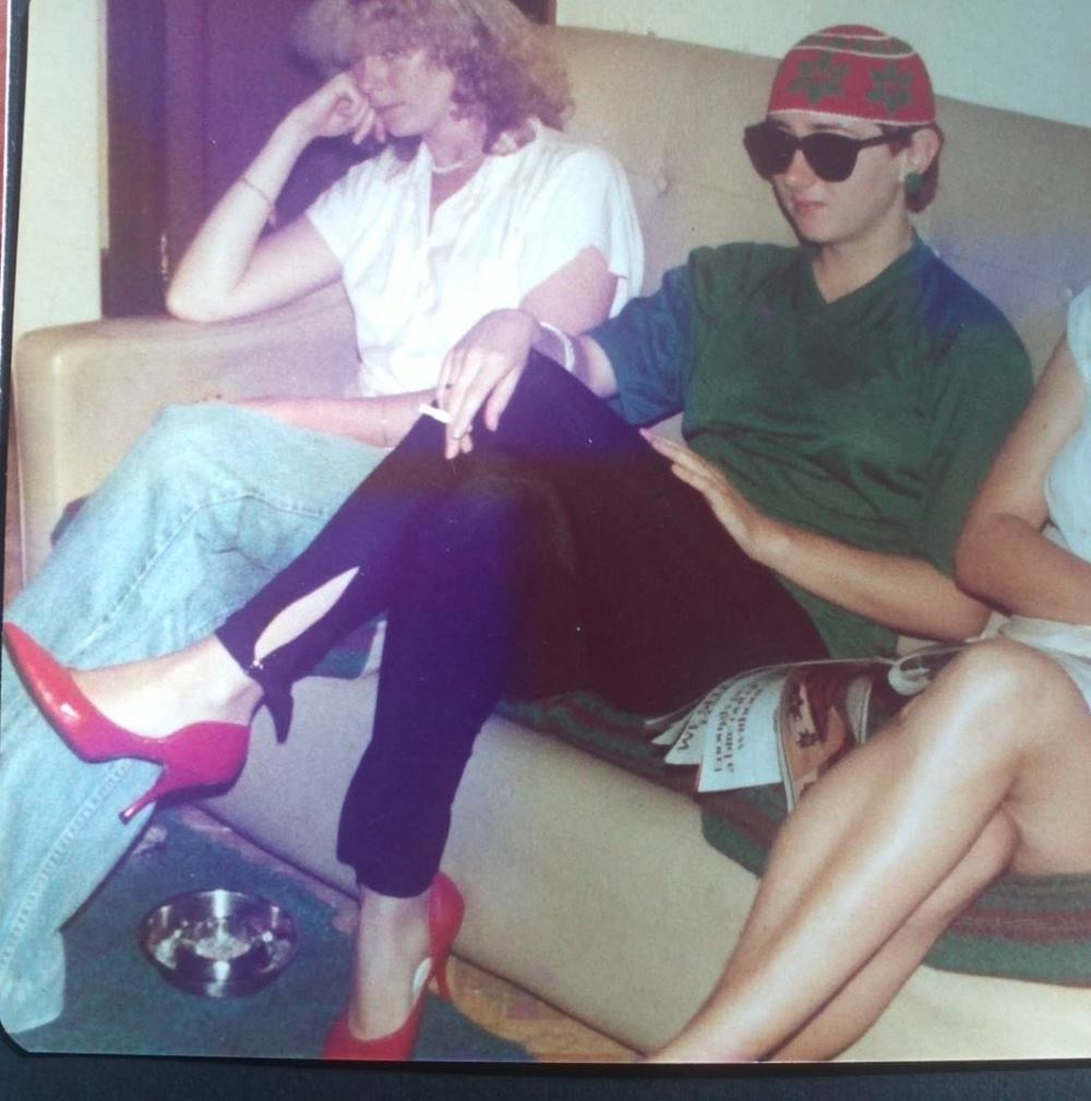 Rain on a sofa between two others.