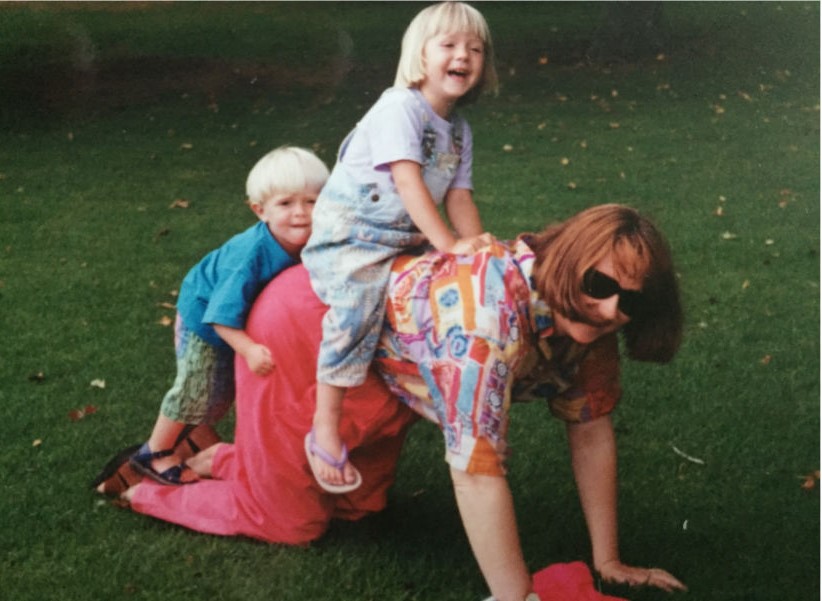Rain piggy backing her two children